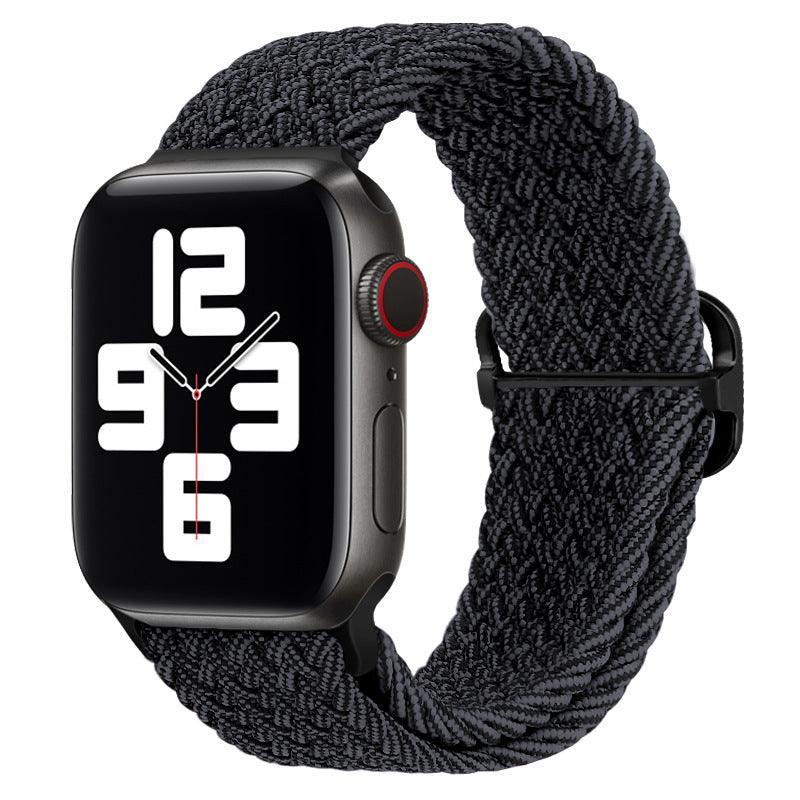 Watchify klokkereim for Apple Watch. En nydelig, komfortabel og elastisk klokkereim med en spenne som ikke er ubehagelig mot huden. Passer Apple Watch series 1/2/3/4/5/6/7. Grå og sort strikket med sort spenne