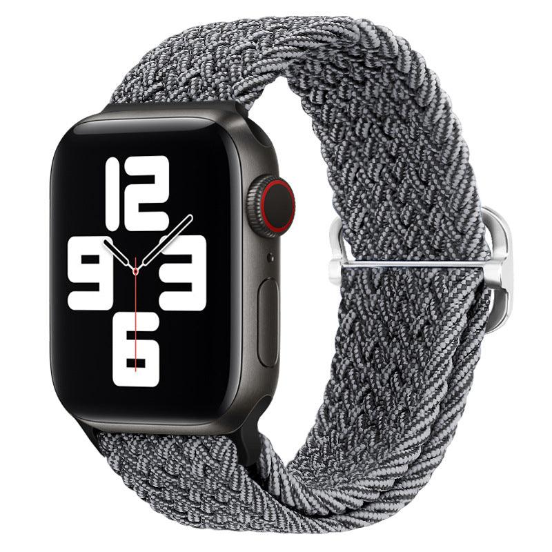Watchify klokkereim for Apple Watch. En nydelig, komfortabel og elastisk klokkereim med en spenne som ikke er ubehagelig mot huden. Passer Apple Watch series 1/2/3/4/5/6/7. grå og sort modell 2 strikket med sort spenne