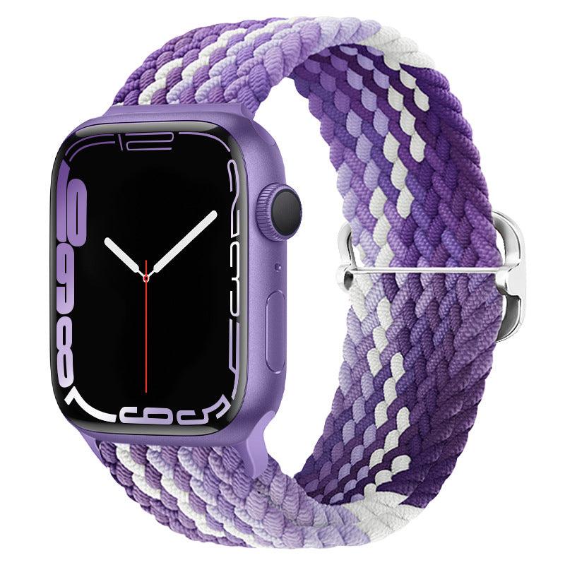 Watchify klokkereim for Apple Watch. En nydelig, komfortabel og elastisk klokkereim med en spenne som ikke er ubehagelig mot huden. Passer Apple Watch series 1/2/3/4/5/6/7/ultra. Lilla/hvit strikket 