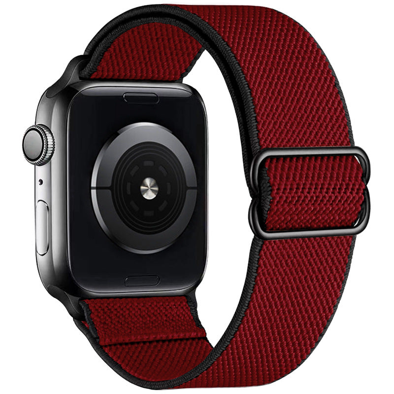 Watchify V2 klokkereim for Apple Watch. En nydelig, komfortabel og elastisk klokkereim med en spenne som ikke er ubehagelig mot huden. Passer Apple Watch series 1/2/3/4/5/6/7. Rød med sort kant og sort spenne