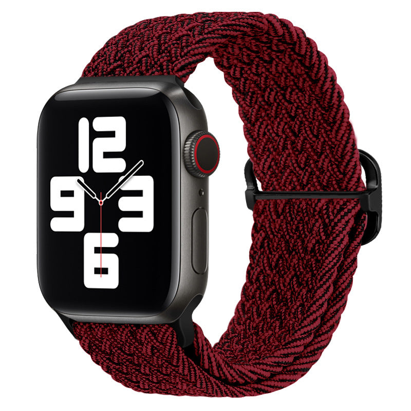 Watchify klokkereim for Apple Watch. En nydelig, komfortabel og elastisk klokkereim med en spenne som ikke er ubehagelig mot huden. Passer Iwatch series 1/2/3/4/5/6/7. Rød og sort modell 2 strikket med sort spenne