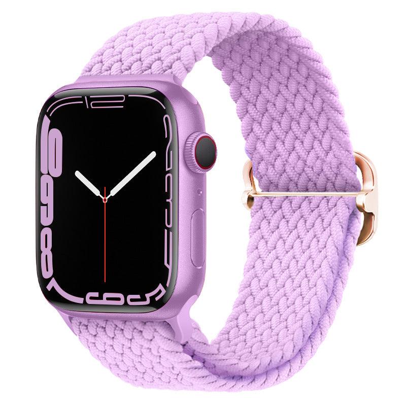 Watchify klokkereim for Apple Watch. En nydelig, komfortabel og elastisk klokkereim med en spenne som ikke er ubehagelig mot huden. Passer Apple Watch series 1/2/3/4/5/6/7/ultra. Lys lilla strikket 