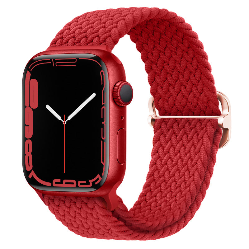 Watchify klokkereim for Apple Watch. En nydelig, komfortabel og elastisk klokkereim med en spenne som ikke er ubehagelig mot huden. Passer Apple Watch series 1/2/3/4/5/6/7. Rød farge med gullspenne