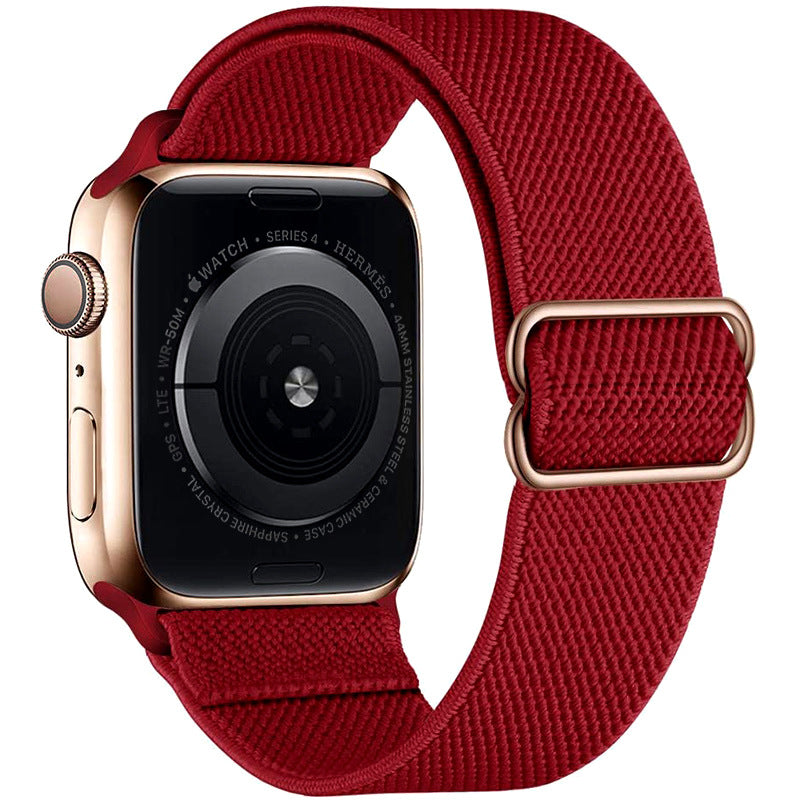 Watchify V2 klokkereim for Apple Watch. En nydelig, komfortabel og elastisk klokkereim med en spenne som ikke er ubehagelig mot huden. Passer Apple Watch series 1/2/3/4/5/6/7. Rød