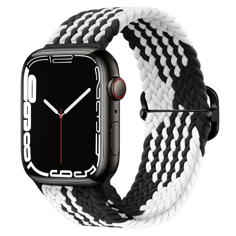 Watchify klokkereim for Apple Watch. En nydelig, komfortabel og elastisk klokkereim med en spenne som ikke er ubehagelig mot huden. Passer Apple Watch series 1/2/3/4/5/6/7. Sort og Hvit med sort spenne